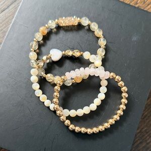 Stack of 3 strechy bracelets.